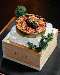 MiLa signature dishes MILA Greek Salad, Wagyu Carpaccio, Kristal Caviar.